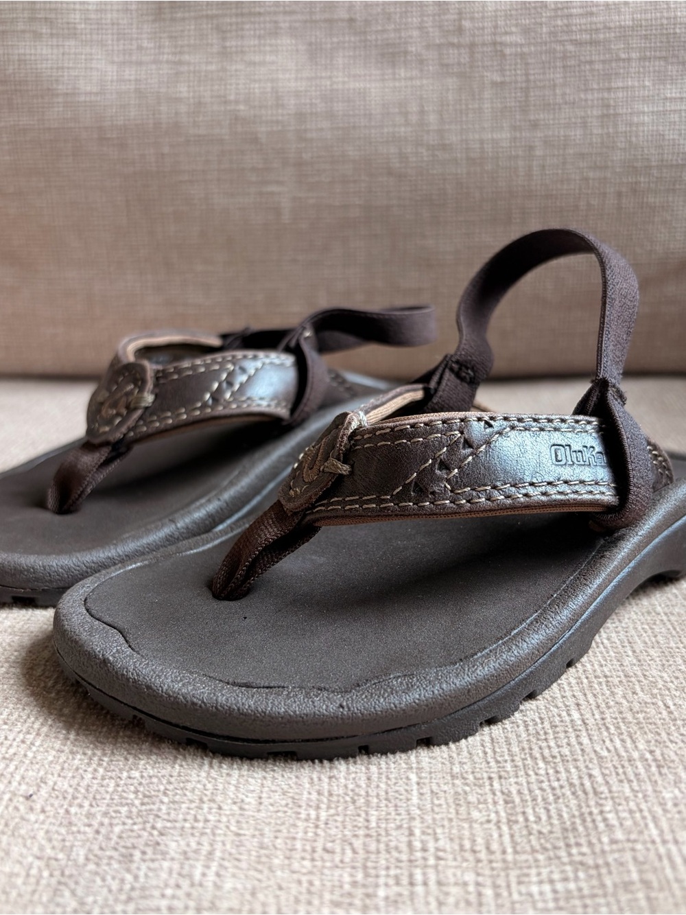 OluKai Dark Brown Leather Backstrap Thong Sandals